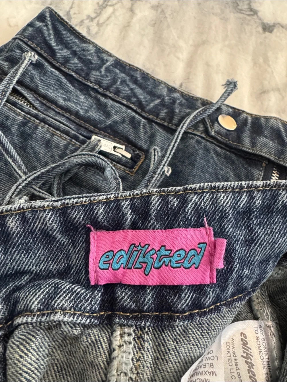 Edikted Washed Blue Denim Mini Skirt and Corset Top with Front Zippers